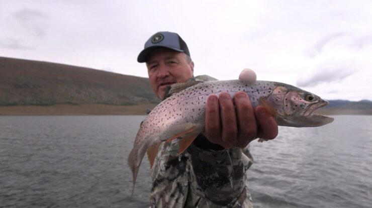 Adam Eakle holding trout